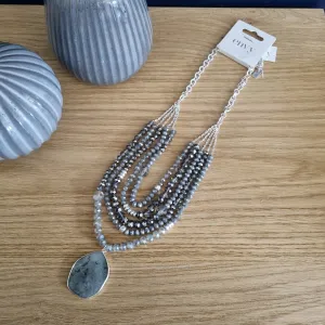 Envy Multi layered bead necklace with Pendant